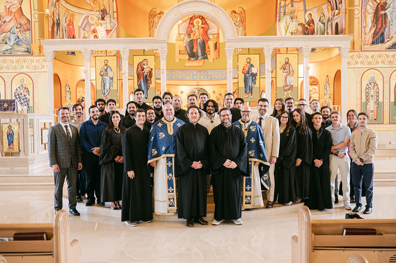 Participants and clergy gathered before the icon screen at Saint Mark Greek Orthodox Church