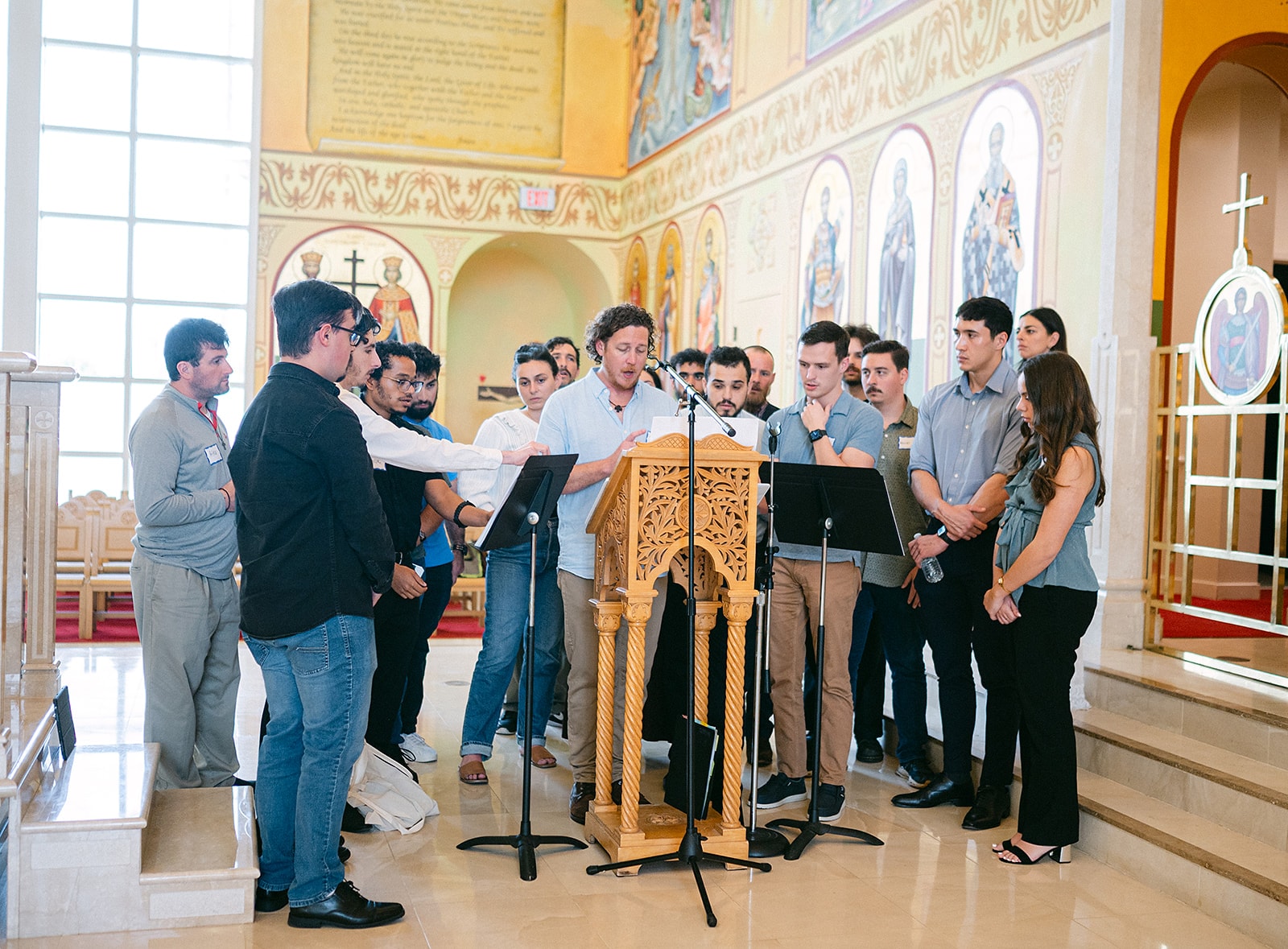 Participants rehearsing together in the nave